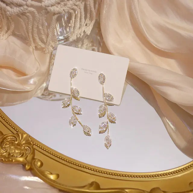 Elegant 14K Gold CZ Stud Earrings - WanderMart Co.